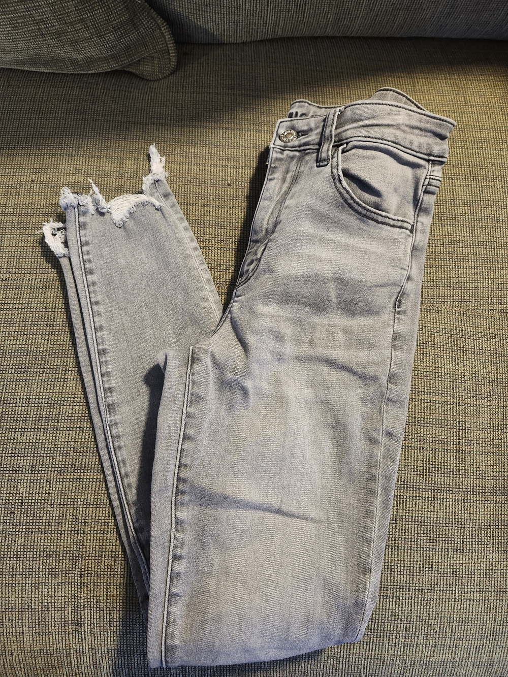 American Eagle Outfitters Light Gray Skinny Jeans with Raw Hem